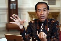 Joko Widodo, Indonesia's president, gestures as he speaks during an interview in Jakarta, Indonesia, on Friday, July 12, 2019. Widodo vowed to implement a wave of reforms to attract foreign investment as he looks to unleash the potential of Southeast Asias biggest economy during his second term in office. Photographer: Dimas Ardian/Bloomberg